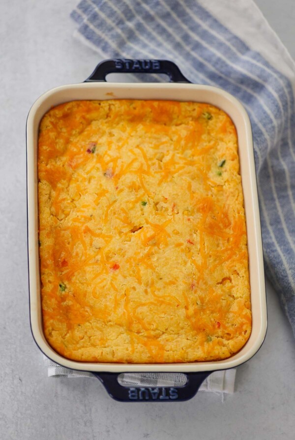 cheesy jalapeno corn casserole in an 8x10 baking dish.