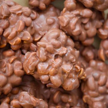 crockpot candy clusters on a baking sheet up close.