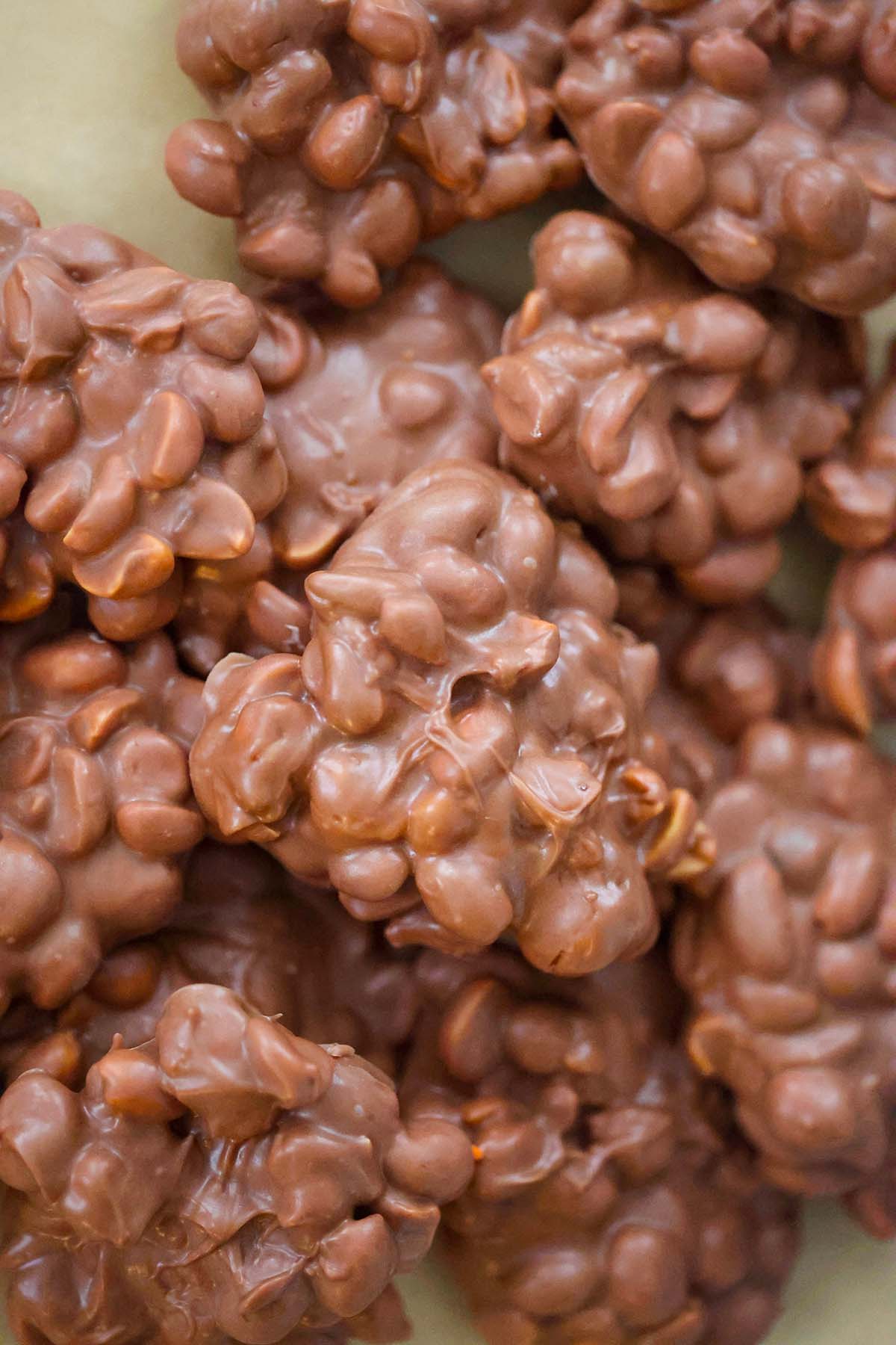 crockpot candy clusters on a baking sheet up close. 