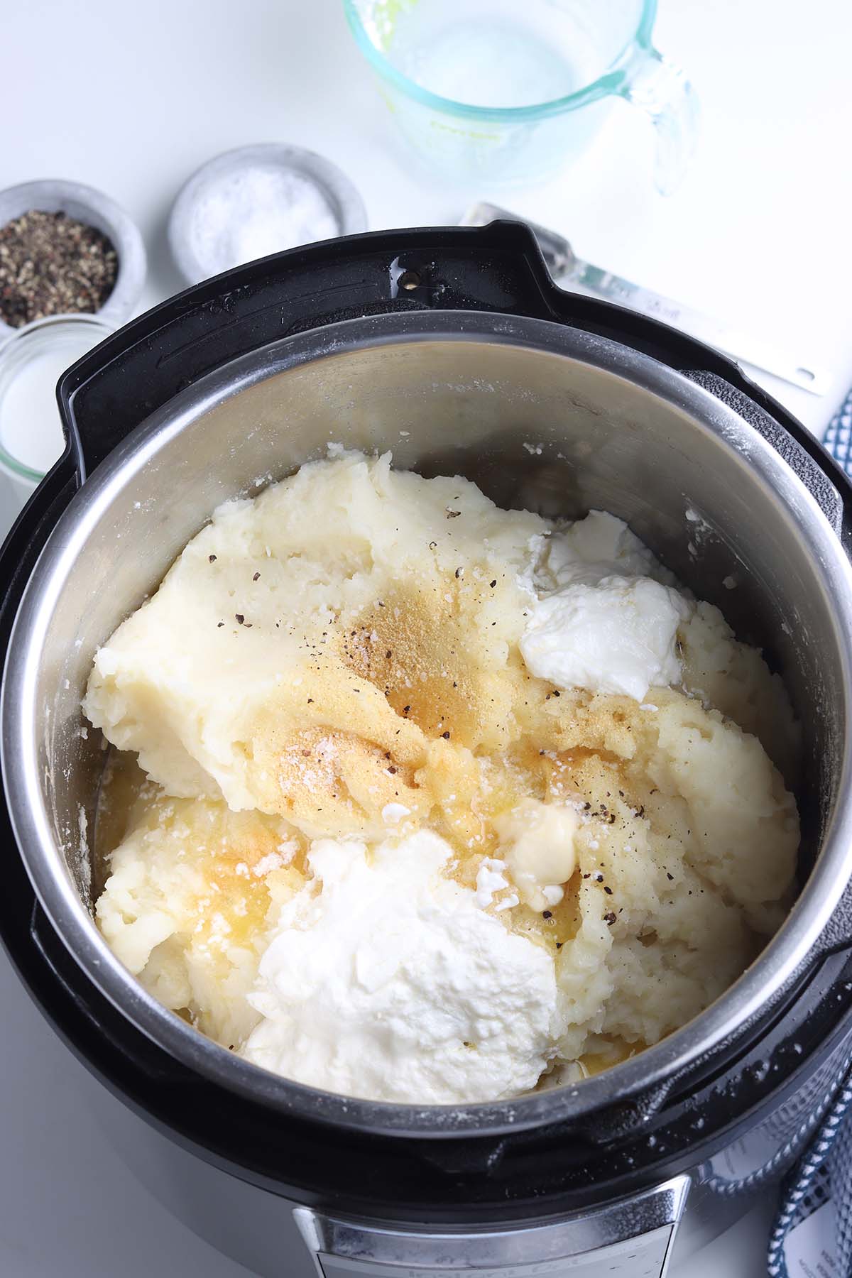 mashed potatoes, sour cream, and garlic powder in the instant pot. 