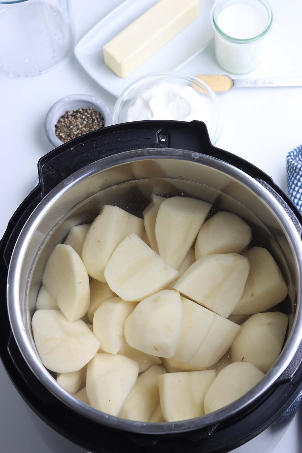 potatoes covered with water in the instant pot. 