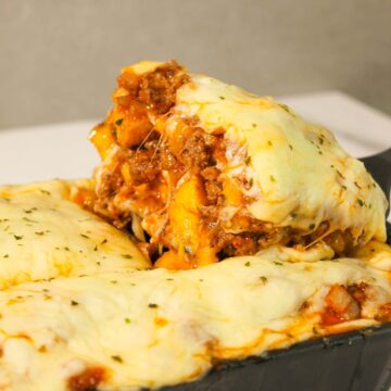 pastelon in a black baking dish.