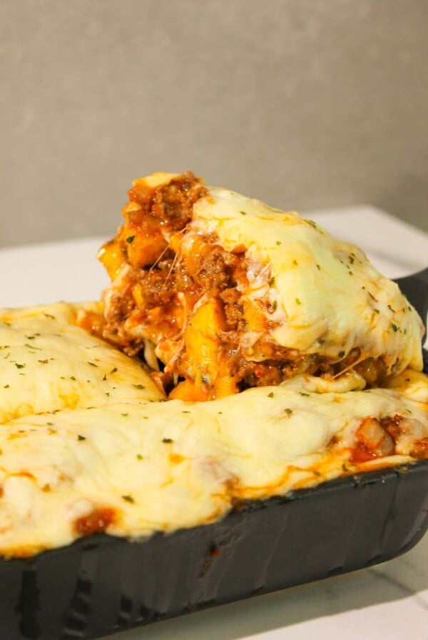 pastelon in a black baking dish.