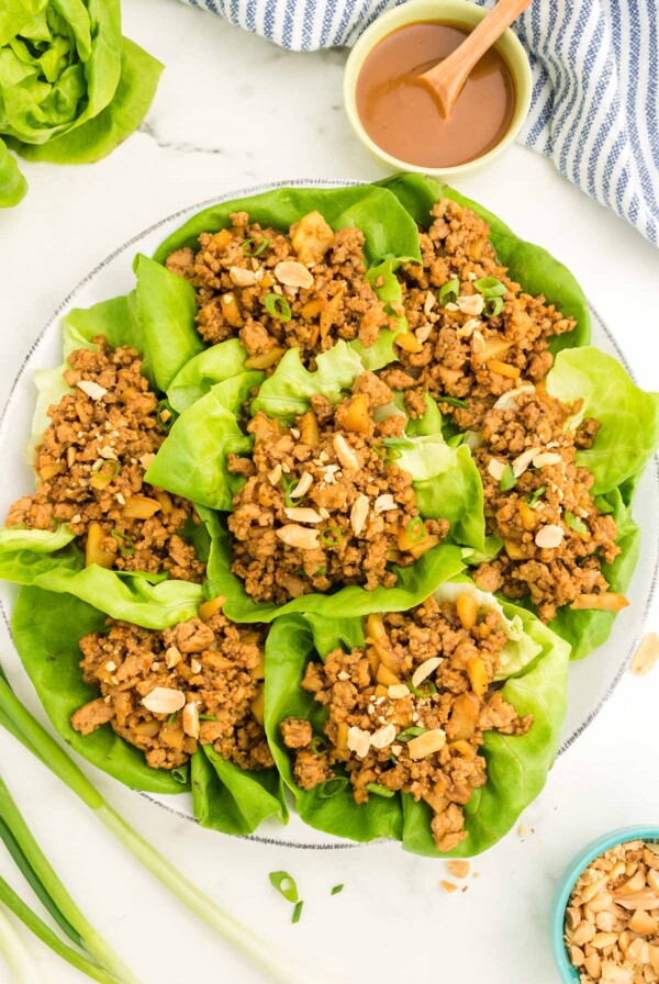 chicken lettuce wraps on a plate.