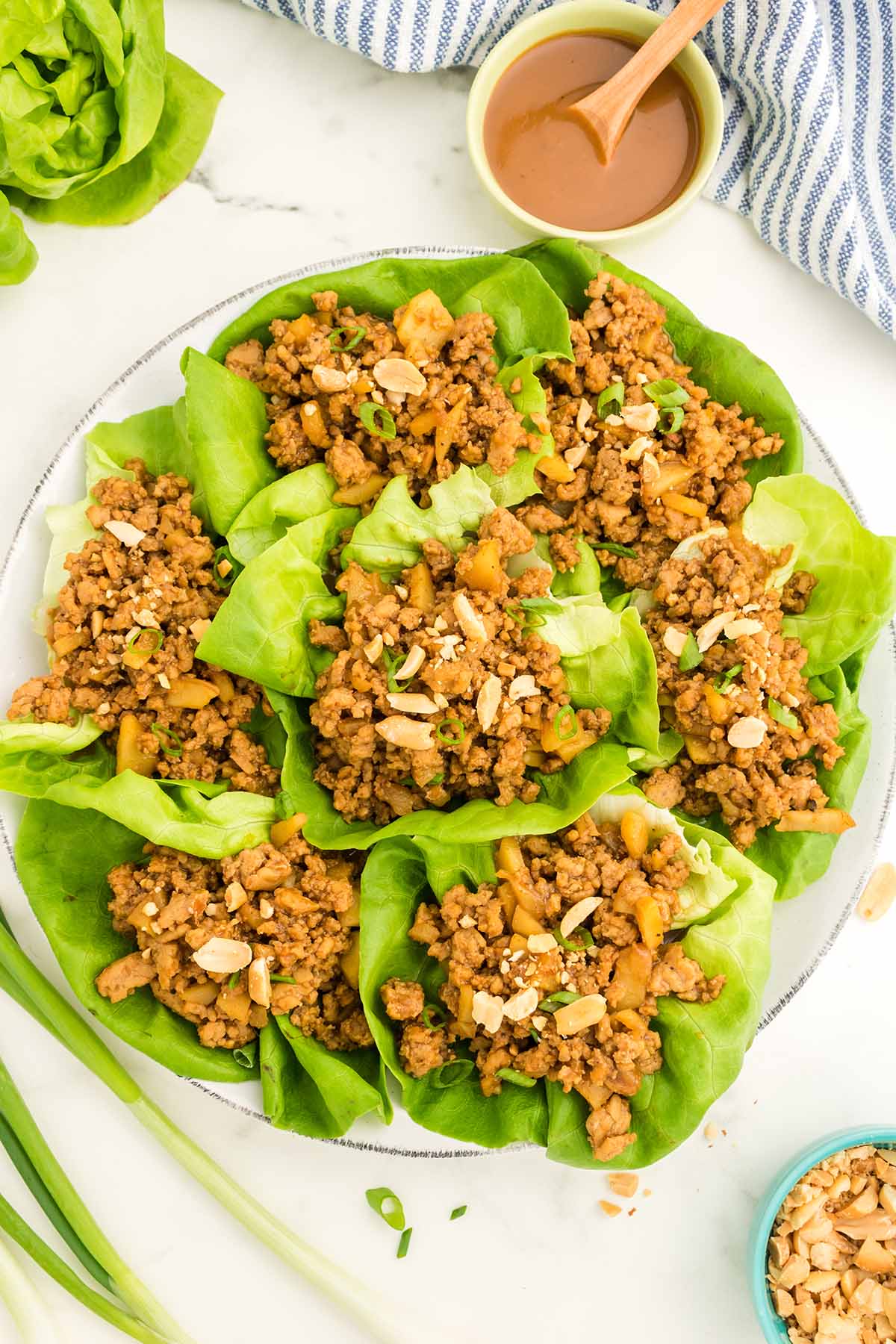 chicken lettuce wraps on a plate.