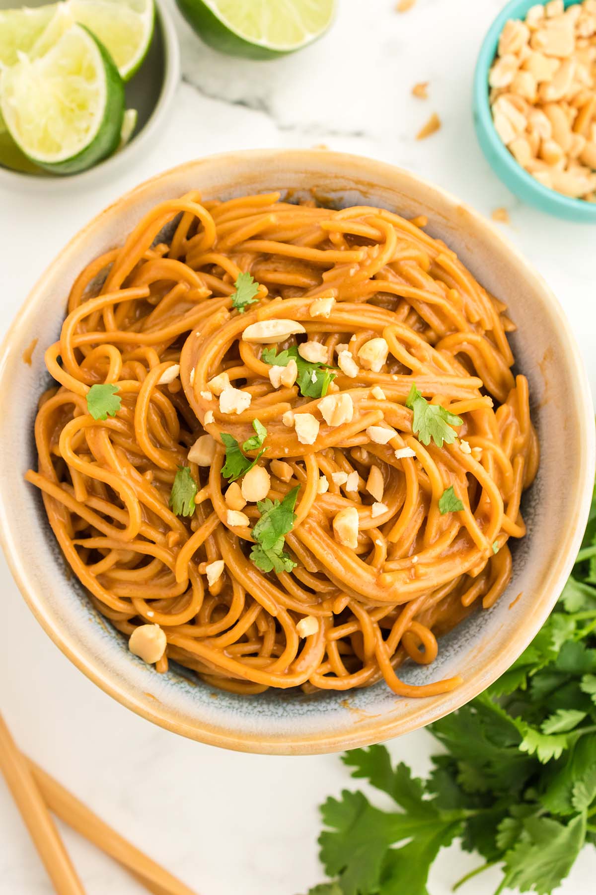Spicy peanut noodles in a bowl. 
