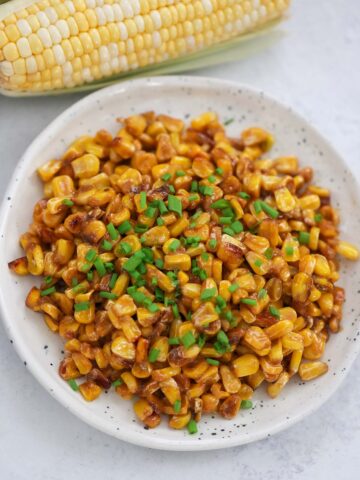 Cajun fried corn with chives on top.