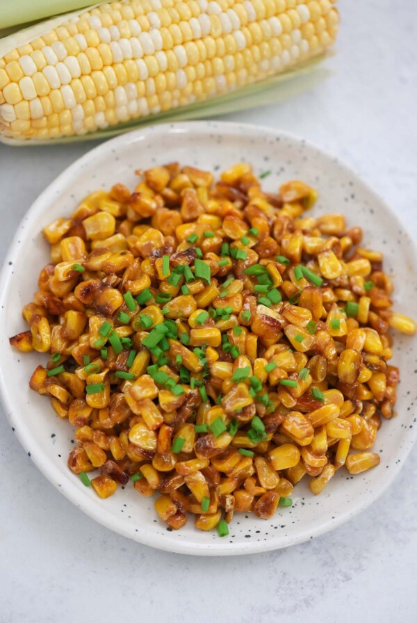 Cajun fried corn with chives on top.