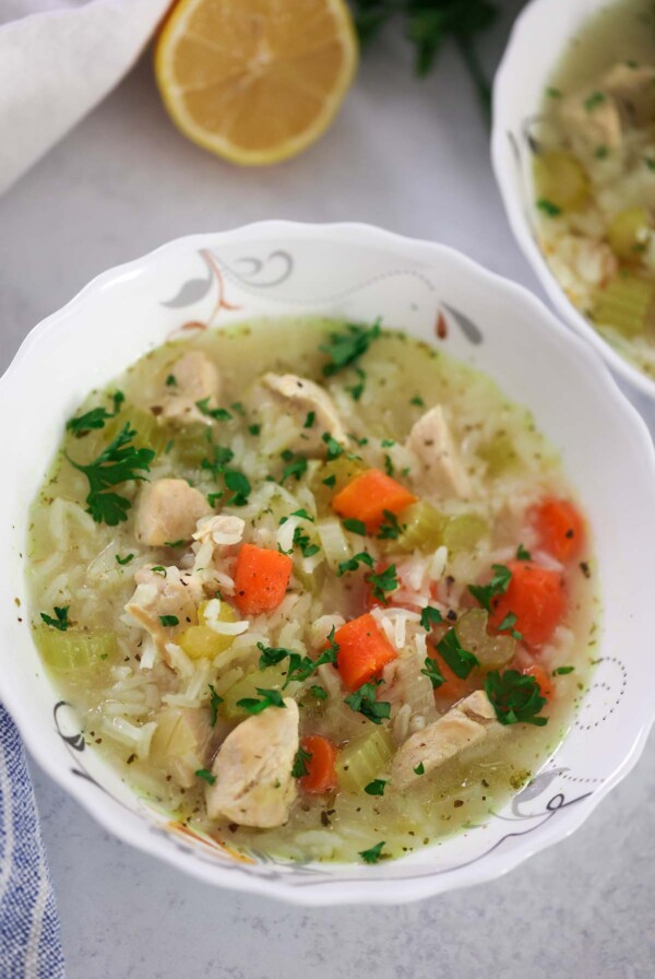 a small bowl of chicken and rice soup up close.