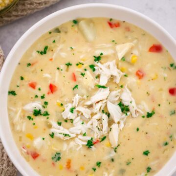 crab and corn bisque in a bowl.