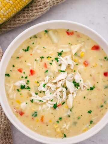 crab and corn bisque in a bowl.