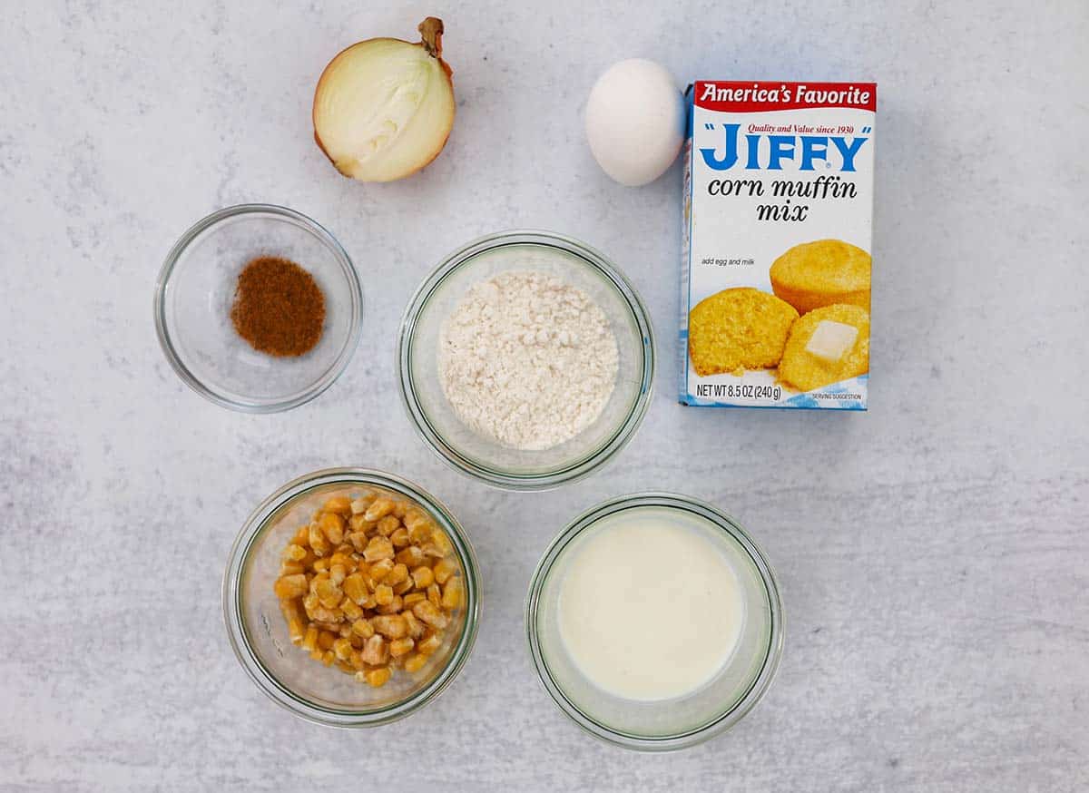Jiffy mix, onion, egg, buttermilk, flour, corn, and old bay seasoning. 