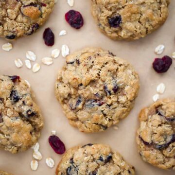 oatmeal craisin cookies on parchment paper.