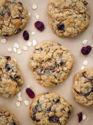 oatmeal craisin cookies on parchment paper.