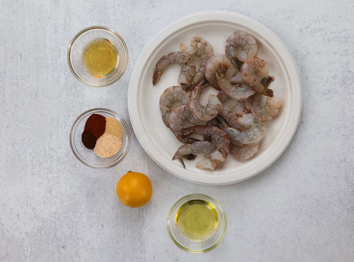 Raw shrimp, spices, oil, honey, and lemon. 