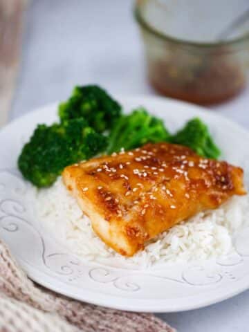 baked honey miso cod fish with rice and broccoli.