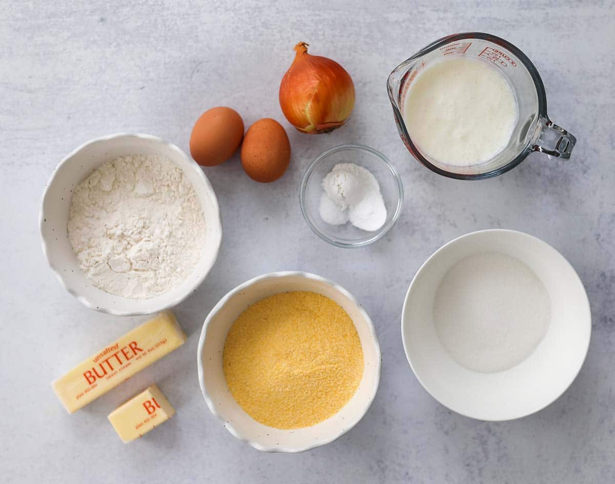 buttermilk, flour, cornmeal, butter, baking powder, baking soda, salt, sugar, eggs, onion. 