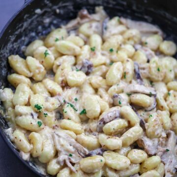 creamy truffle gnocchi in a skillet.