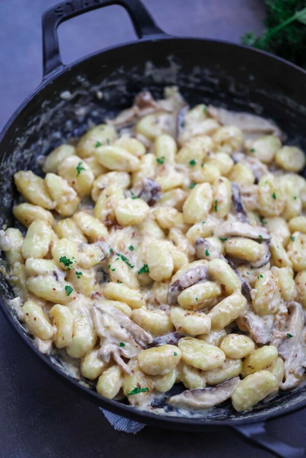 creamy truffle gnocchi in a skillet.