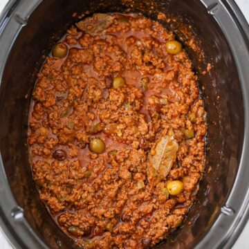 Cooked Cuban picadillo in the crockpot.