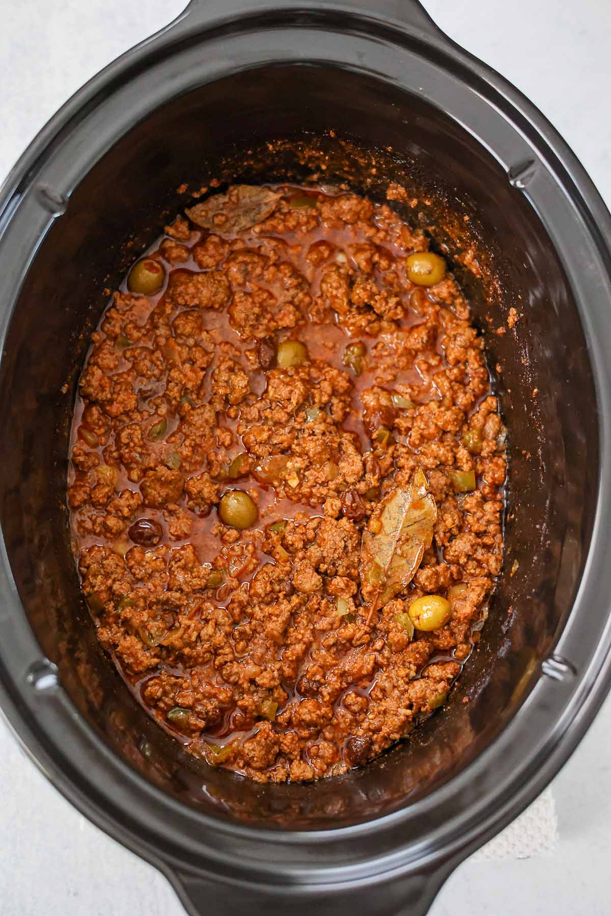 Cooked Cuban picadillo in the crockpot. 