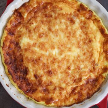 ham and gruyere cheese crustless quiche in a 9 inch baking dish.