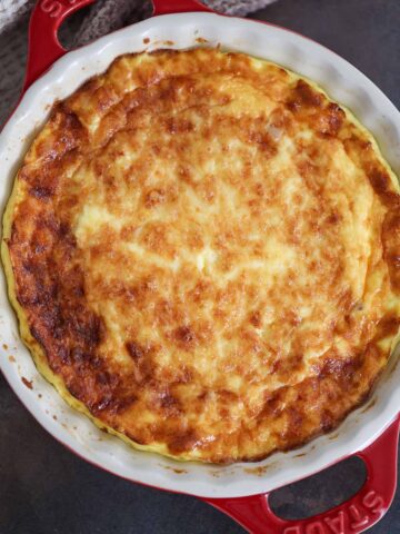 ham and gruyere cheese crustless quiche in a 9 inch baking dish.