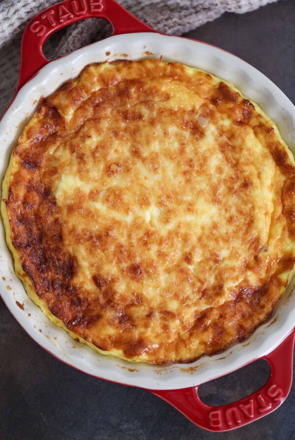ham and gruyere cheese crustless quiche in a 9 inch baking dish.