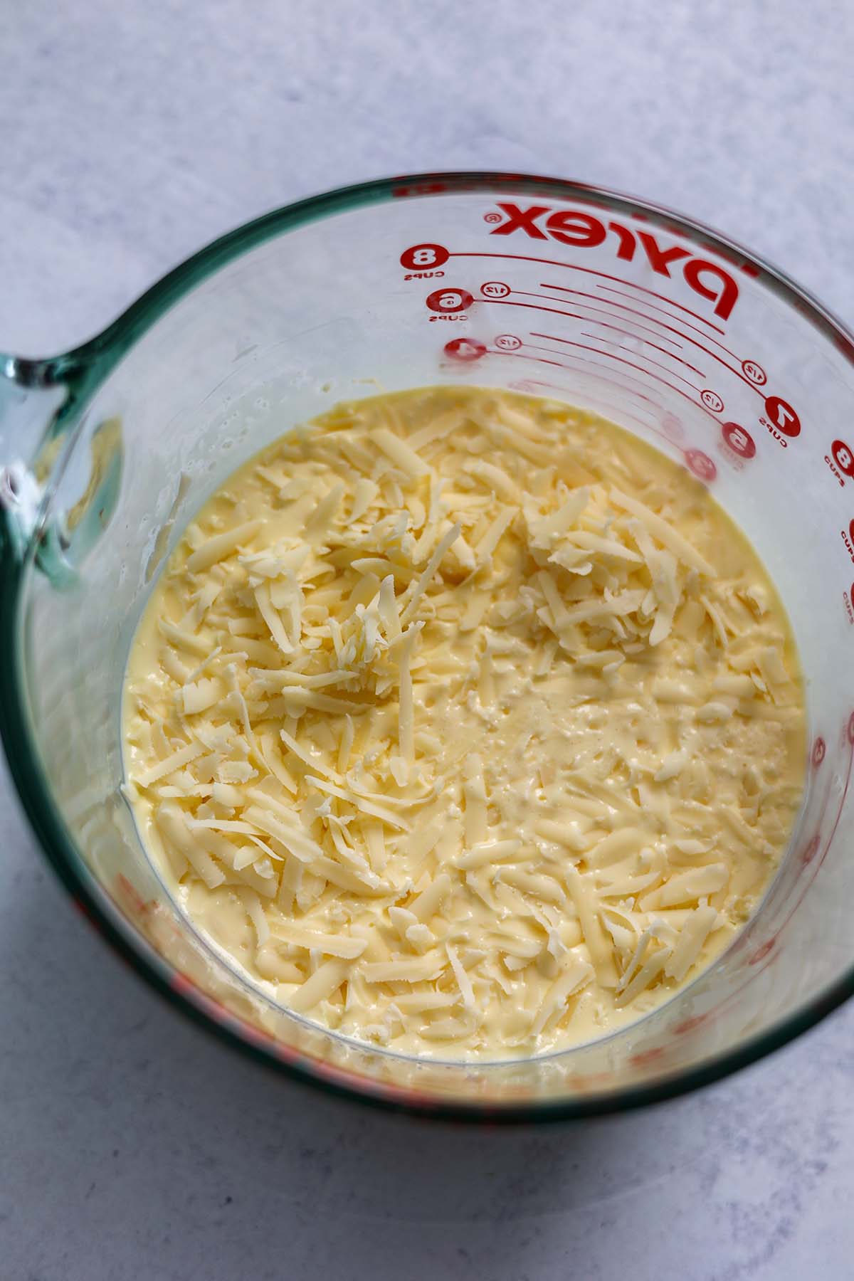 egg and cheese mixture in a measuring cup. 