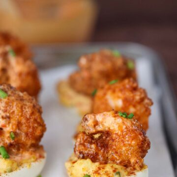 fried shrimp deviled eggs on a plate.