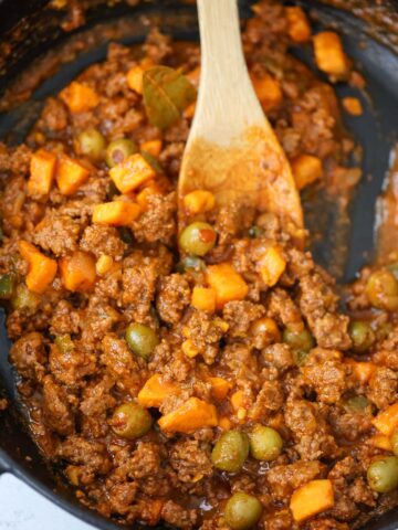 picadillo with sweet potatoes in a skillet.