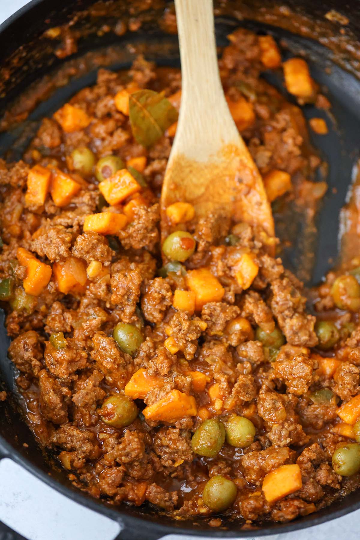 picadillo with sweet potatoes in a skillet. 