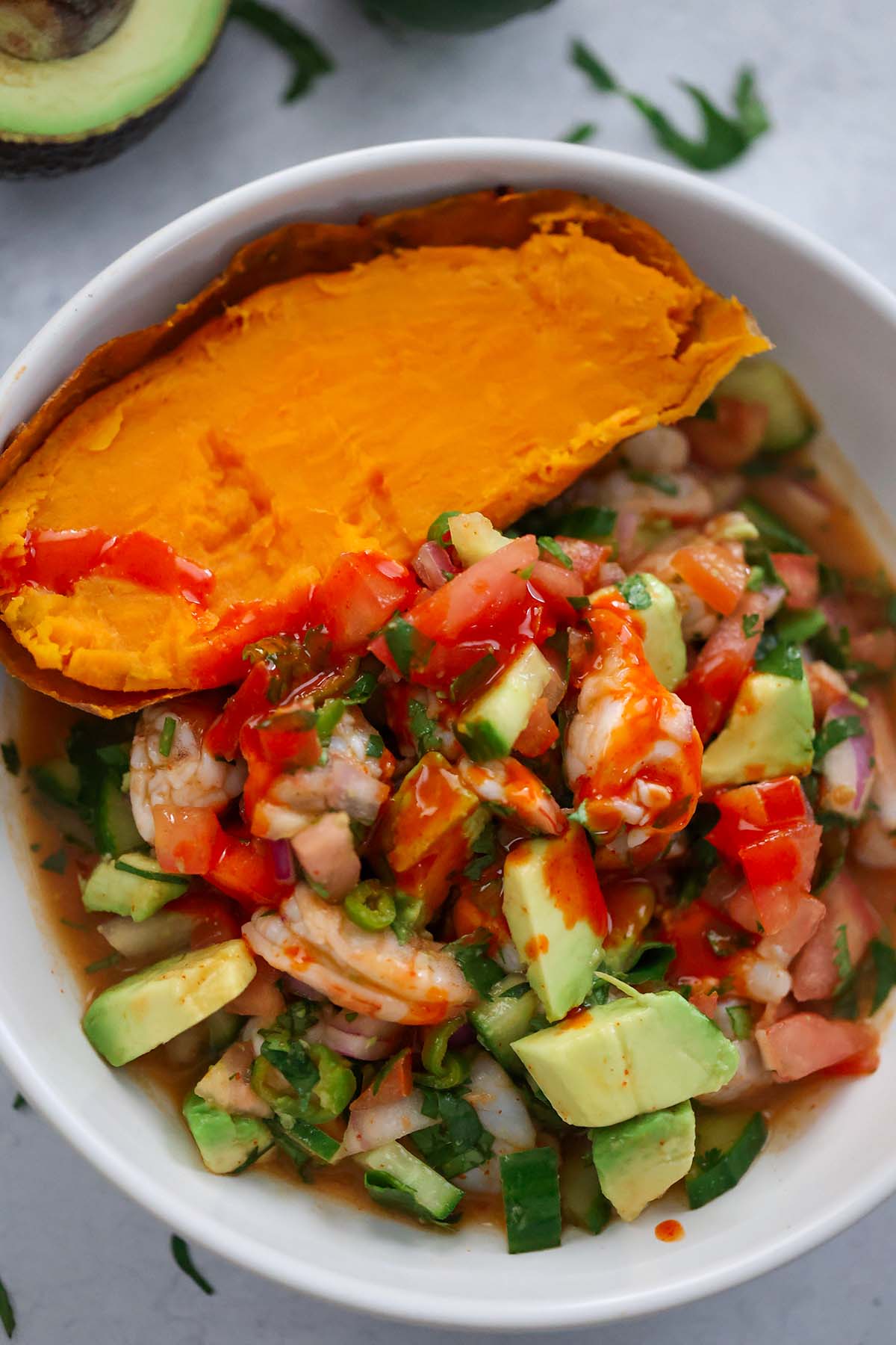 shrimp ceviche with sweet potato on the side. 