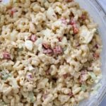 macaroni salad in a large glass bowl.