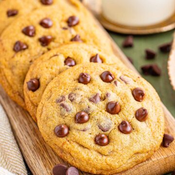 Mrs. Fields copycat chocolate chip cookies on a wooden cutting board.