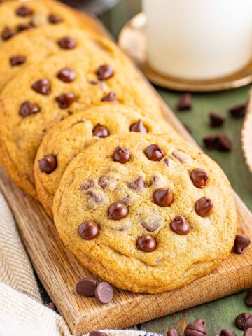 Mrs. Fields copycat chocolate chip cookies on a wooden cutting board.