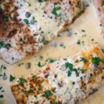 creamy mahi mahi fillets in a skillet.