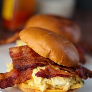 egg salad sandwich with bacon and cheese.