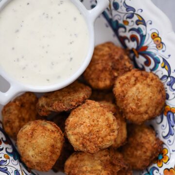 Southern fried pickles with ranch dip on the side.