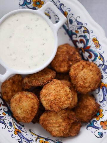Southern fried pickles with ranch dip on the side.