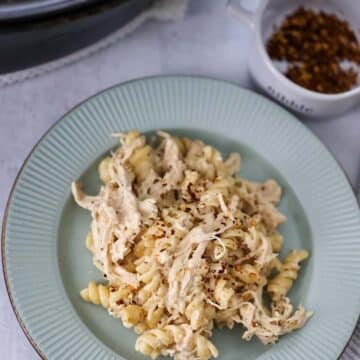 crockpot creamy chicken pasta on a plate.