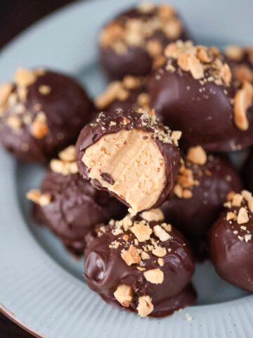 Peanut butter balls on a plate.