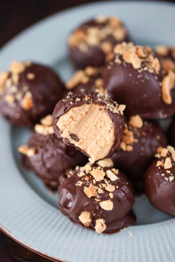 Peanut butter balls on a plate.