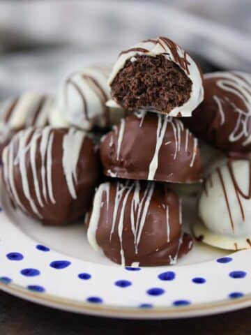 oreo balls on a plate.