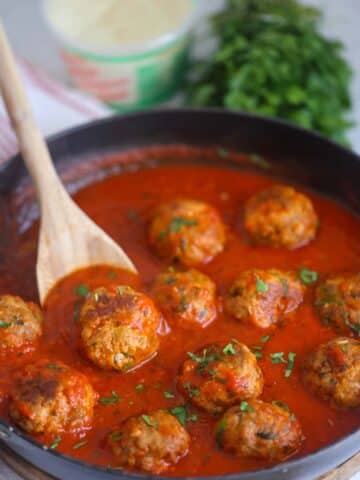 baked meatballs in marinara sauce.