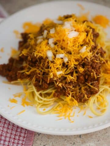 Cincinnati chili on a white plate.