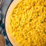 Mac and cheese in a blue dutch oven.