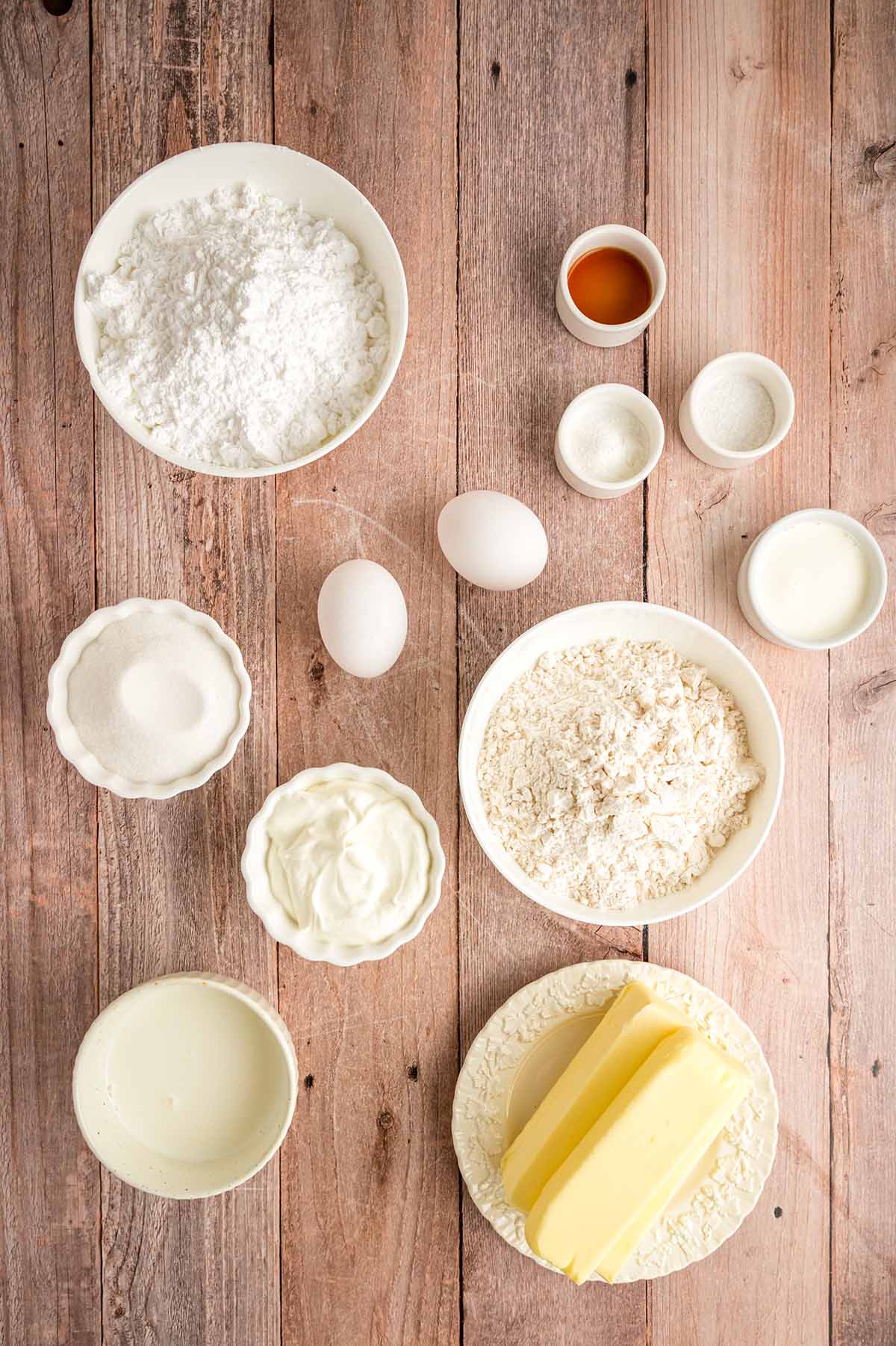Ingredients for vanilla cupcakes and vanilla buttercream.