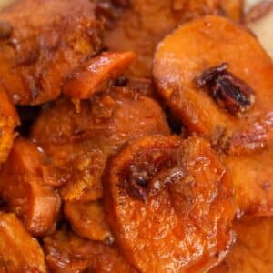 bourbon candied yams with pecans on top.