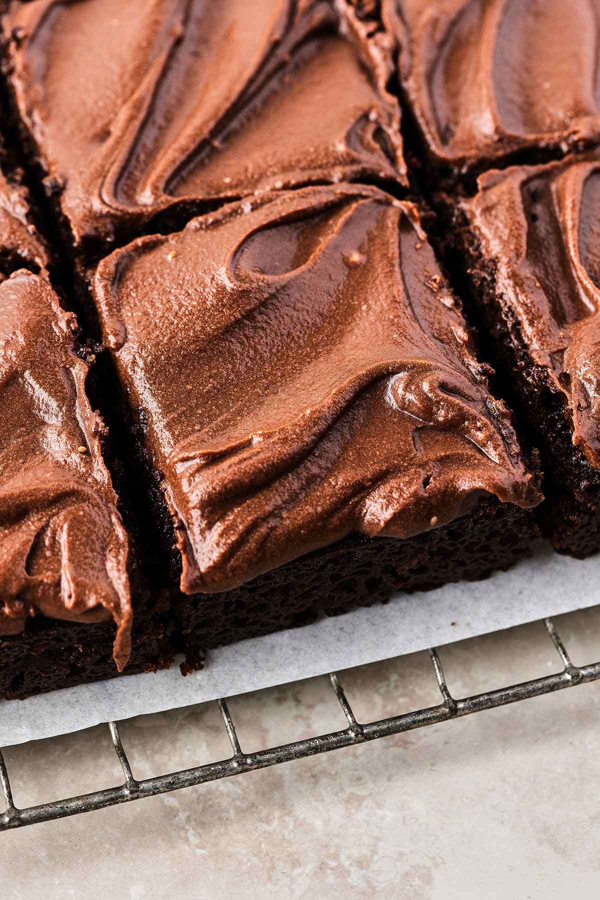 8x8 chocolate wacky cake sliced into squares. 